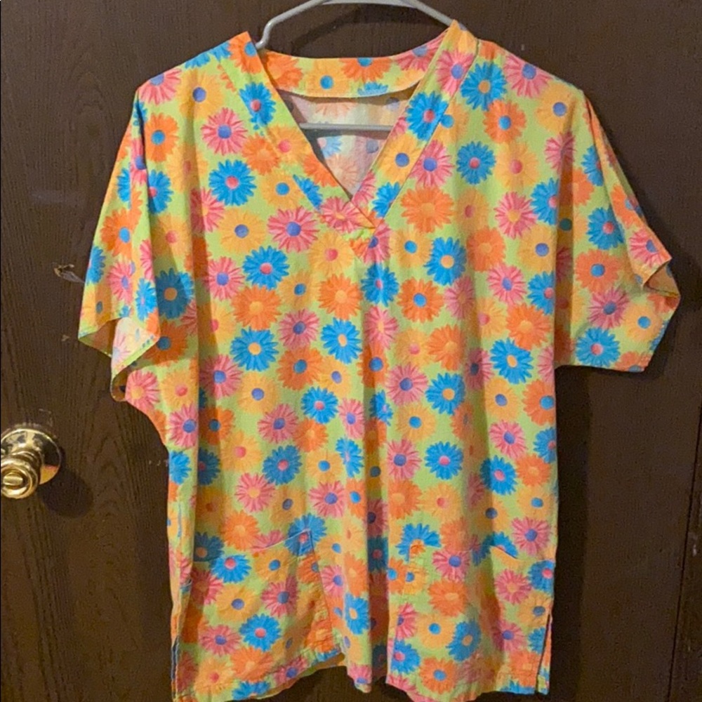 Colorful scrub top.